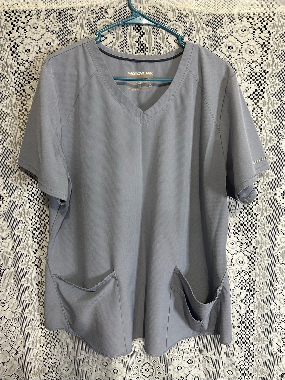 Skechers Women's Short Sleeve V-Neck Top in Light Blue-Gray